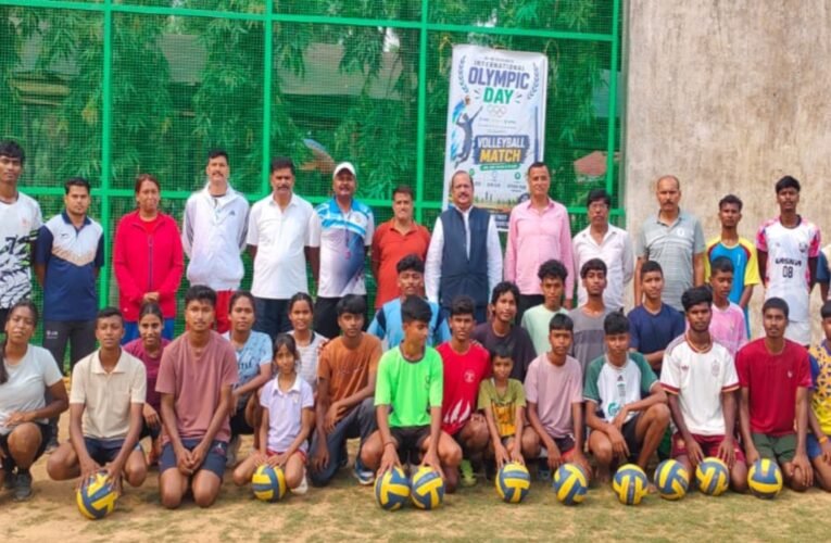 Exhibition volleyball match held at Oxygen Park during Olympic Week; players convey a message of sportsmanship.