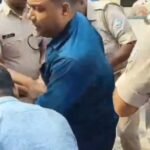 Youth arrested at Koderma railway station with a loaded pistol and 24 cartridges; accused of threatening passengers on the train.