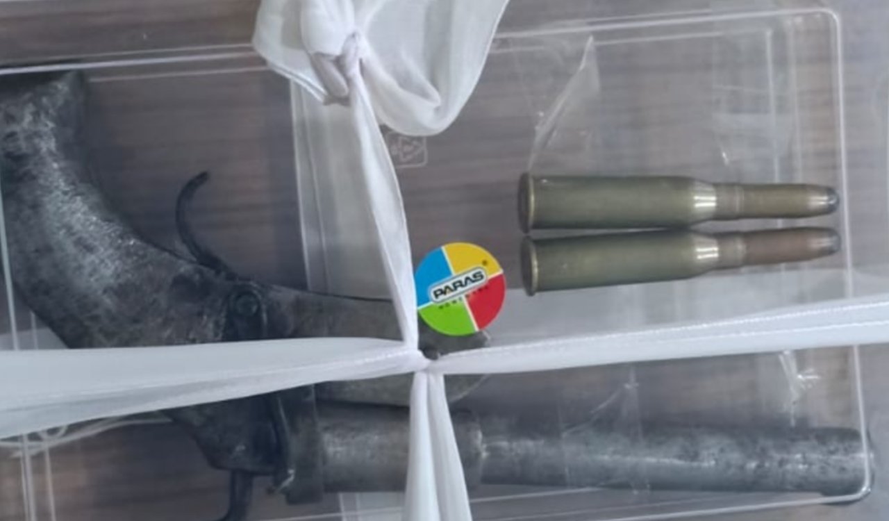 Police arrived at Purulia Road following a report of a domestic dispute and recovered a country-made pistol and two live rounds from a minor.