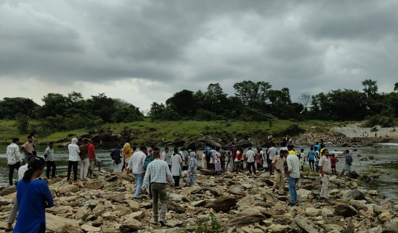 Two teenagers drowned while bathing in the Asangi check dam; one body has been recovered, and the search for the other is ongoing.