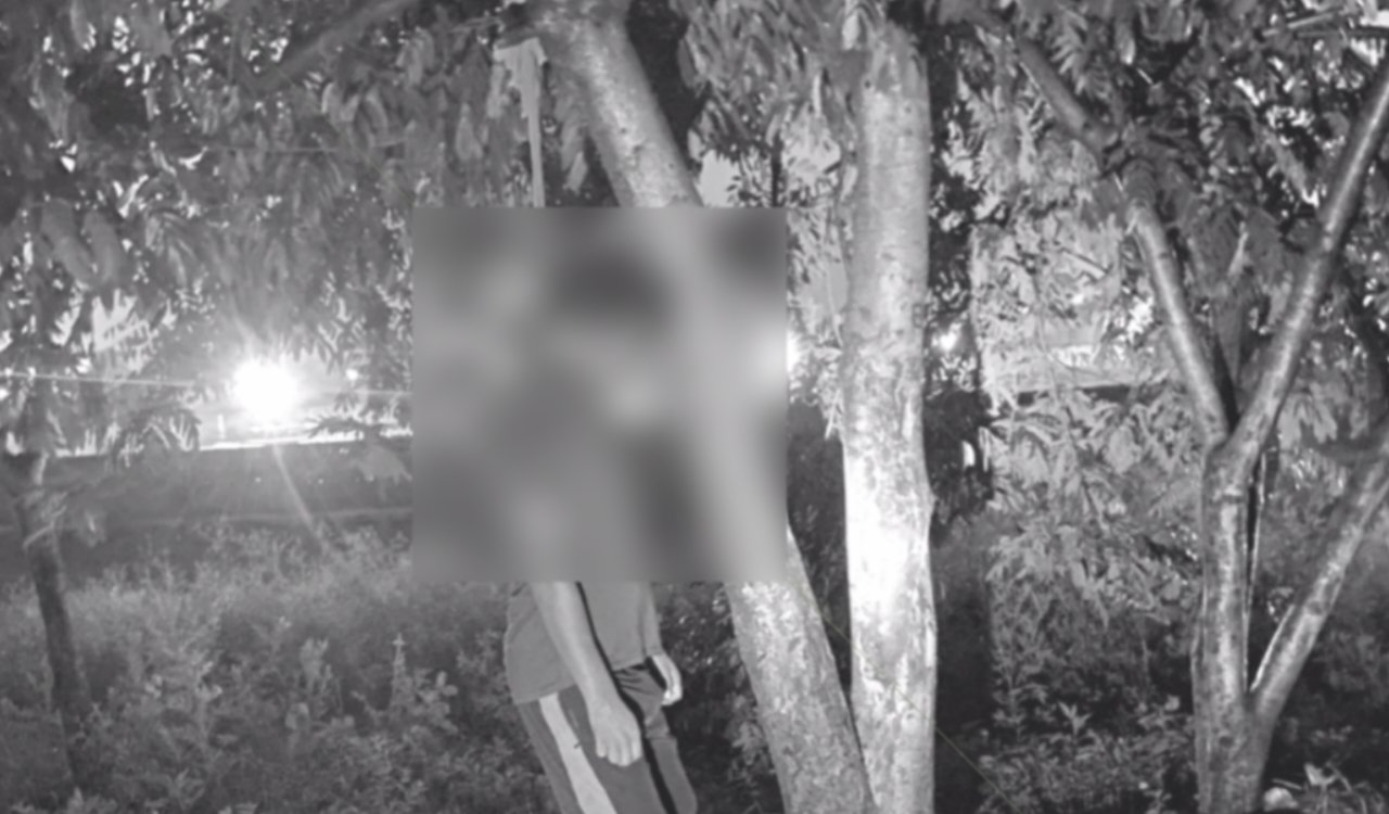 Young man's body found hanging from a tree near Smart City; e-rickshaw parked nearby deepens the mystery.