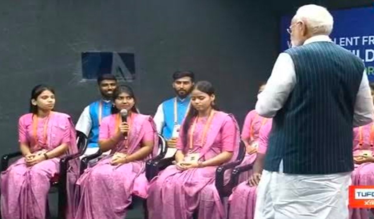 Two daughters from Birni, Jharkhand, shine in Sanand; PM Modi lauds their struggle and success.