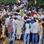 Former Minister Mannan Mallick laid to rest with state honors; massive crowd gathers at Shamsher Nagar graveyard.