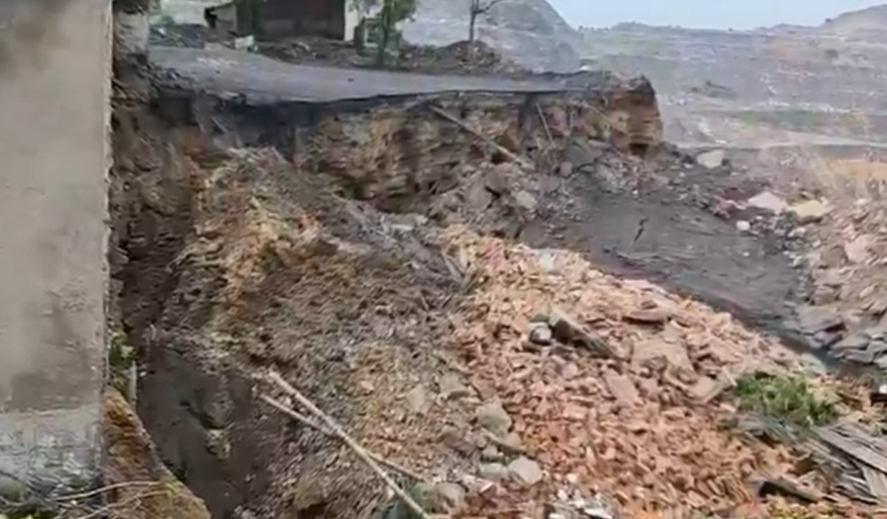 Ground caves in again in Dhanbad: Several houses in Buttu Babu Bangla Basti reduced to rubble; major tragedy averted.