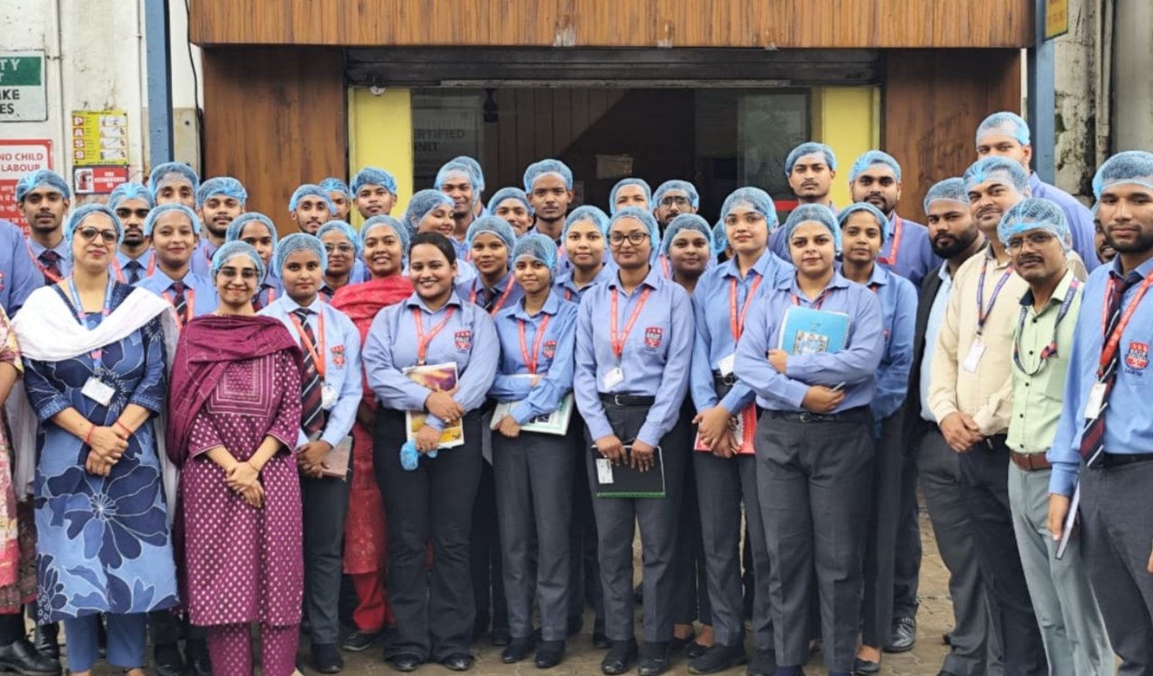 Students learn the nuances of the industrial world during a visit to the Parle-G factory; an industrial tour by RKDF University.