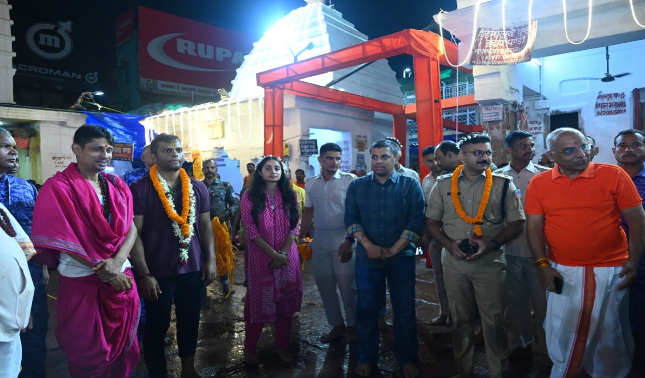 Water offering commenced with the 'Argha' arrangement; DC and SP took charge.