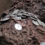 200-year-old house collapses in the rain; 'treasure' of over 300 silver coins found in the debris; stirs curiosity in the village.