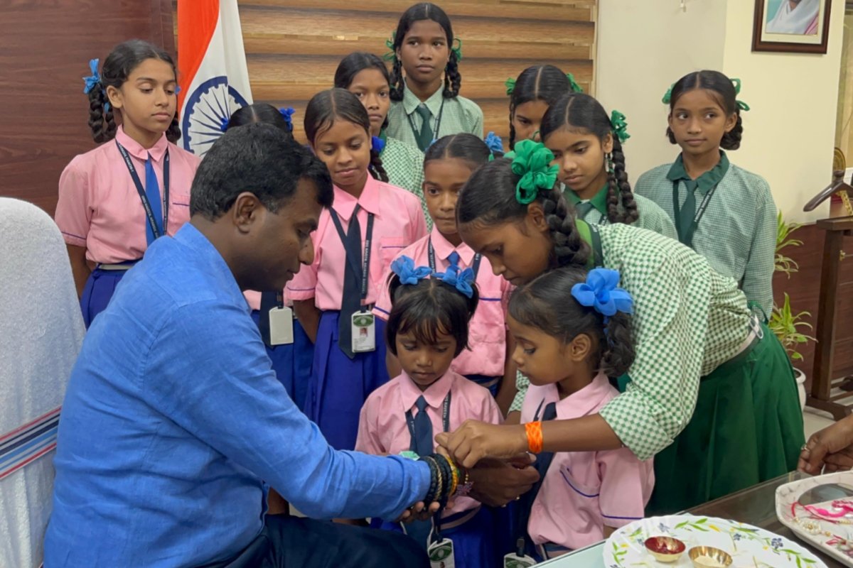 The warmth of Raksha Bandhan resonated at the Collectorate as female students tied handmade rakhis to the Deputy Commissioner.
