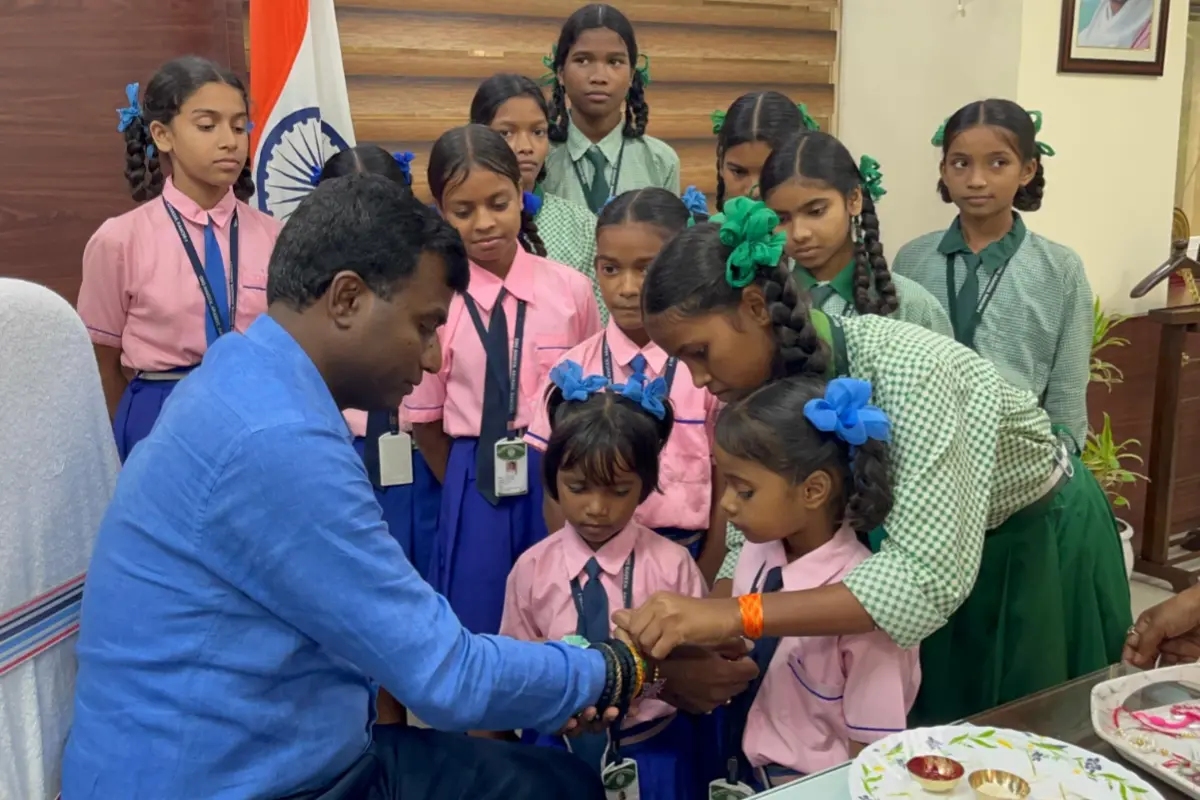 The warmth of Raksha Bandhan resonated at the Collectorate as female students tied handmade rakhis to the Deputy Commissioner.