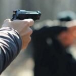 Gunshot fired during liquor party hits youth in the stomach; condition critical.