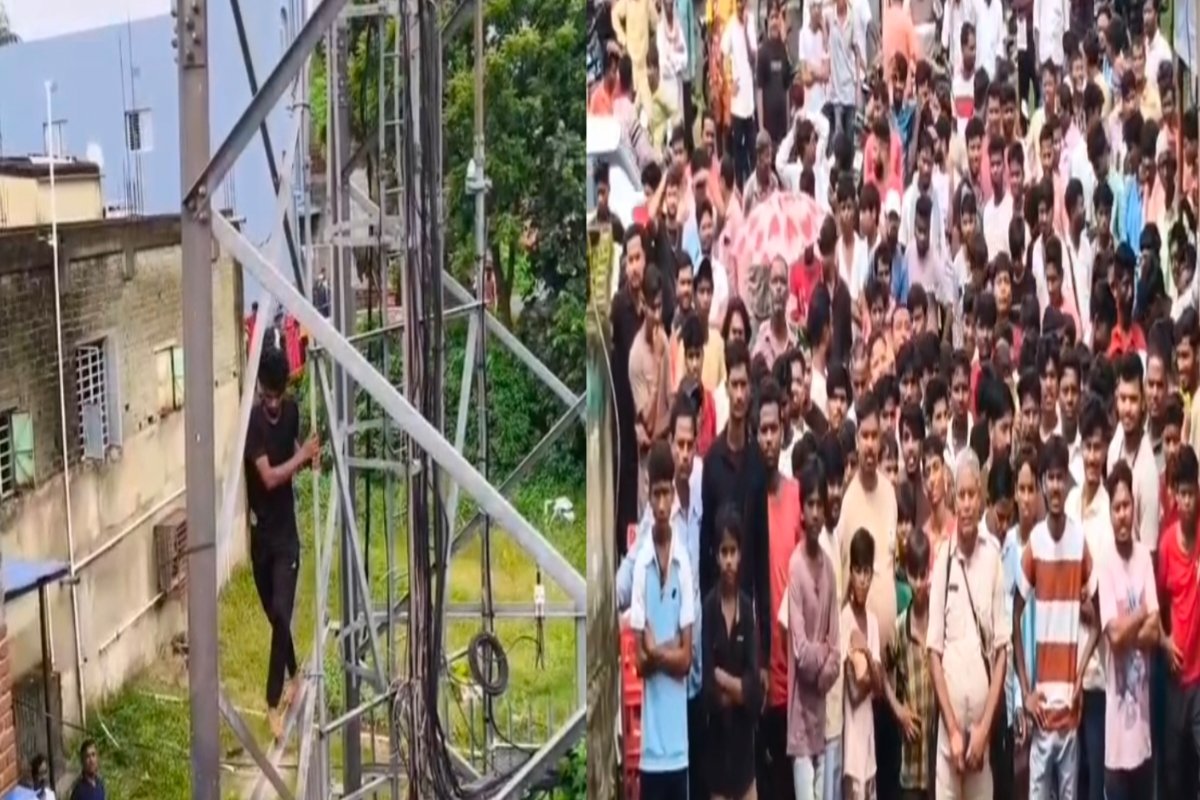 Youth climbs mobile tower to protest against corrupt system.