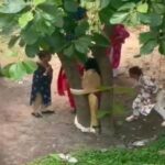 woman-tied-tree-beaten-up-money